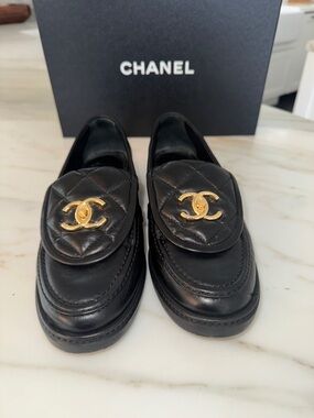 CHANEL Black Quilted Leather Loafers with Gold CC Emblem